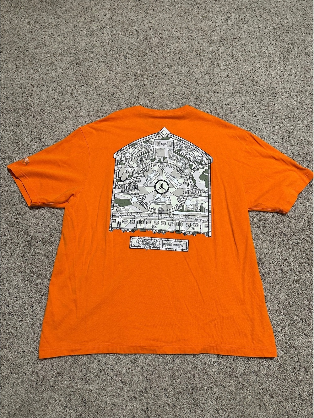 Jordan Orange Graphic Tee with Unique Back Design